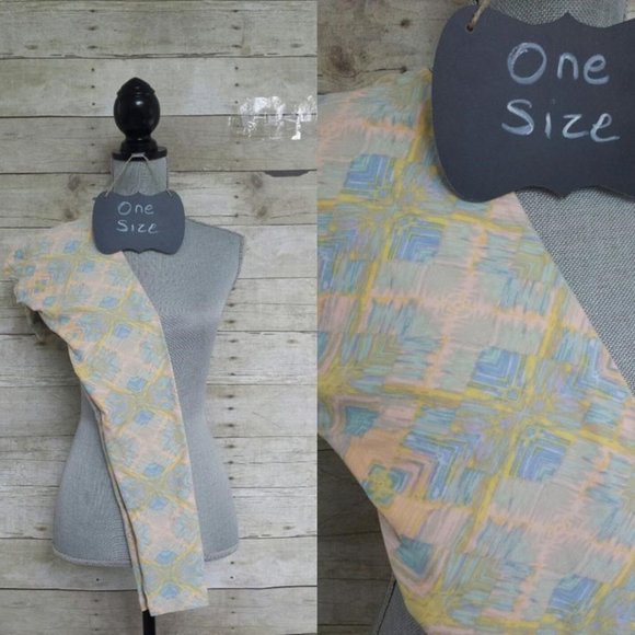 NWT OS One Size LuLaRoe Legging - Green Blue Yellow Pastels on Pale Peach - Picture 1 of 1
